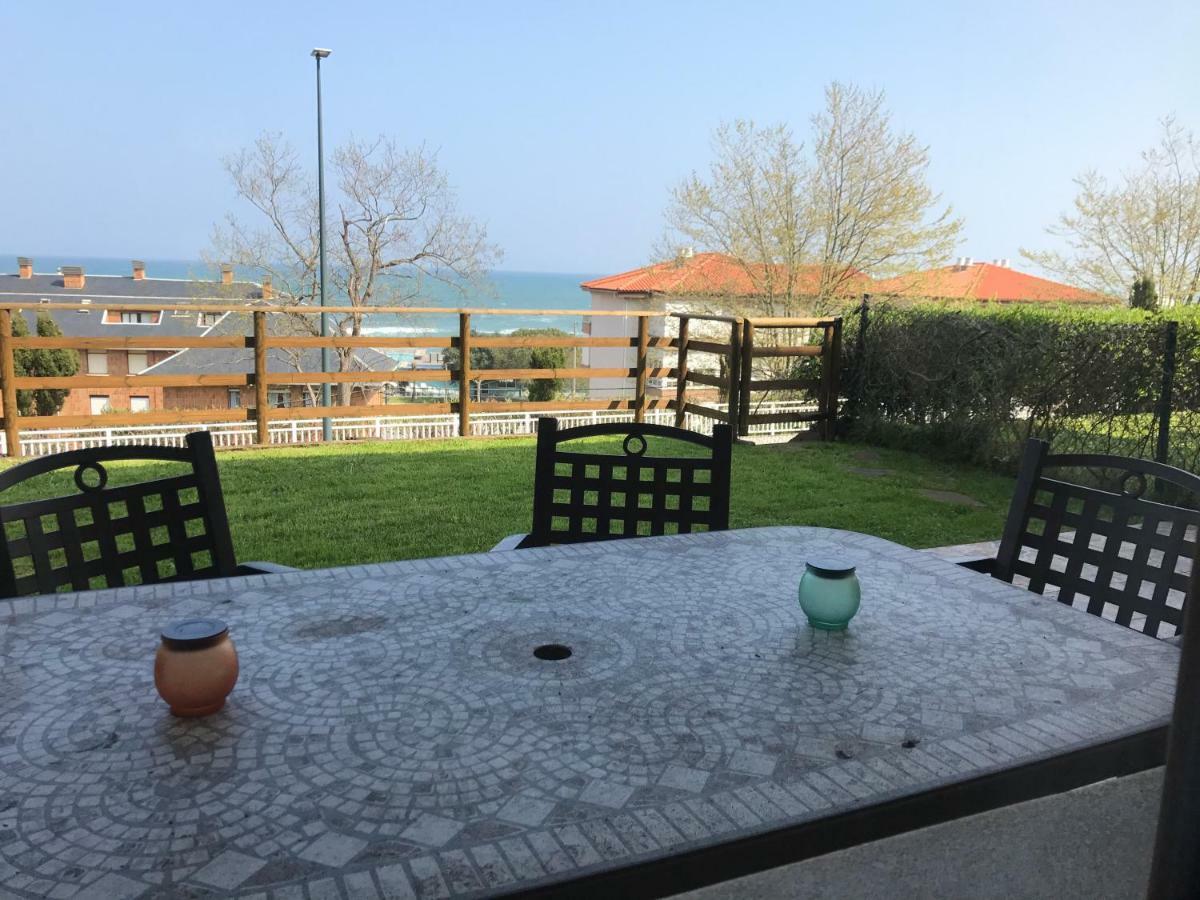 Casa De Las Flores - Apartamento Con Jardin Privado Frente A La Playa De 코밀라스 외부 사진