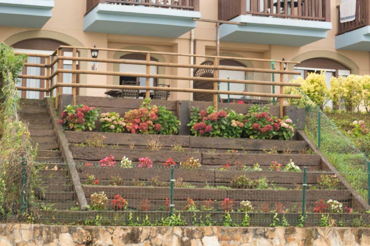 Casa De Las Flores - Apartamento Con Jardin Privado Frente A La Playa De 코밀라스 외부 사진